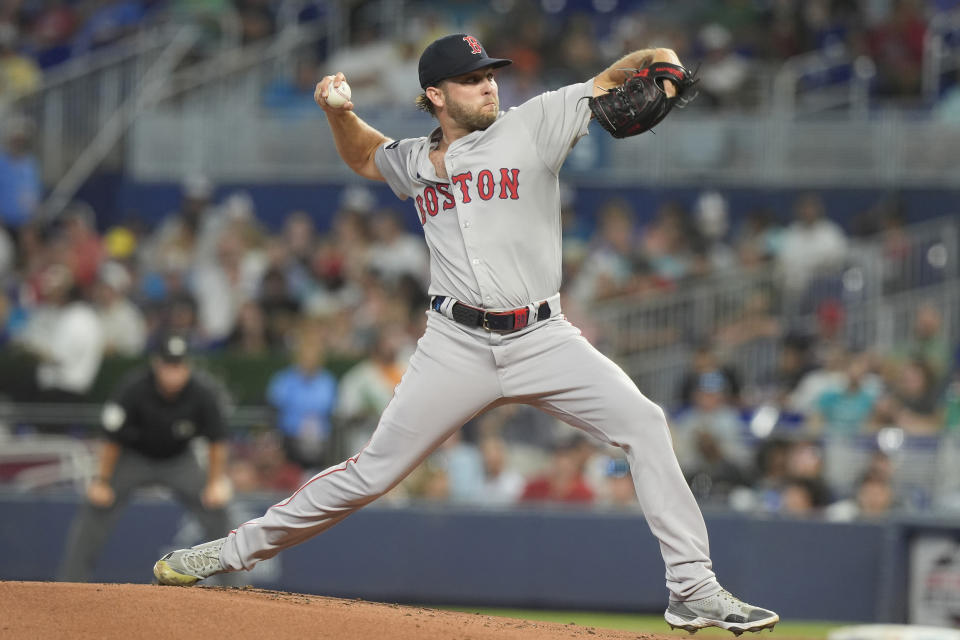 Boston Red Sox pitcher Kutter Crawford (50) aims a pitch during the first inning of a baseball game against the Miami Marlins, Tuesday, July 2, 2024, in Miami. (AP Photo/Marta Lavandier)