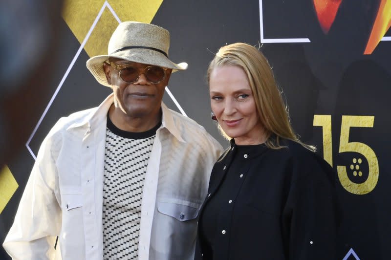 Samuel L, Jackson (L) and Uma Thurman attend the 30th anniversary screening of "Pulp Fiction" at the TCM Classic Film Festival on Thursday. Photo by Jim Ruymen/UPI