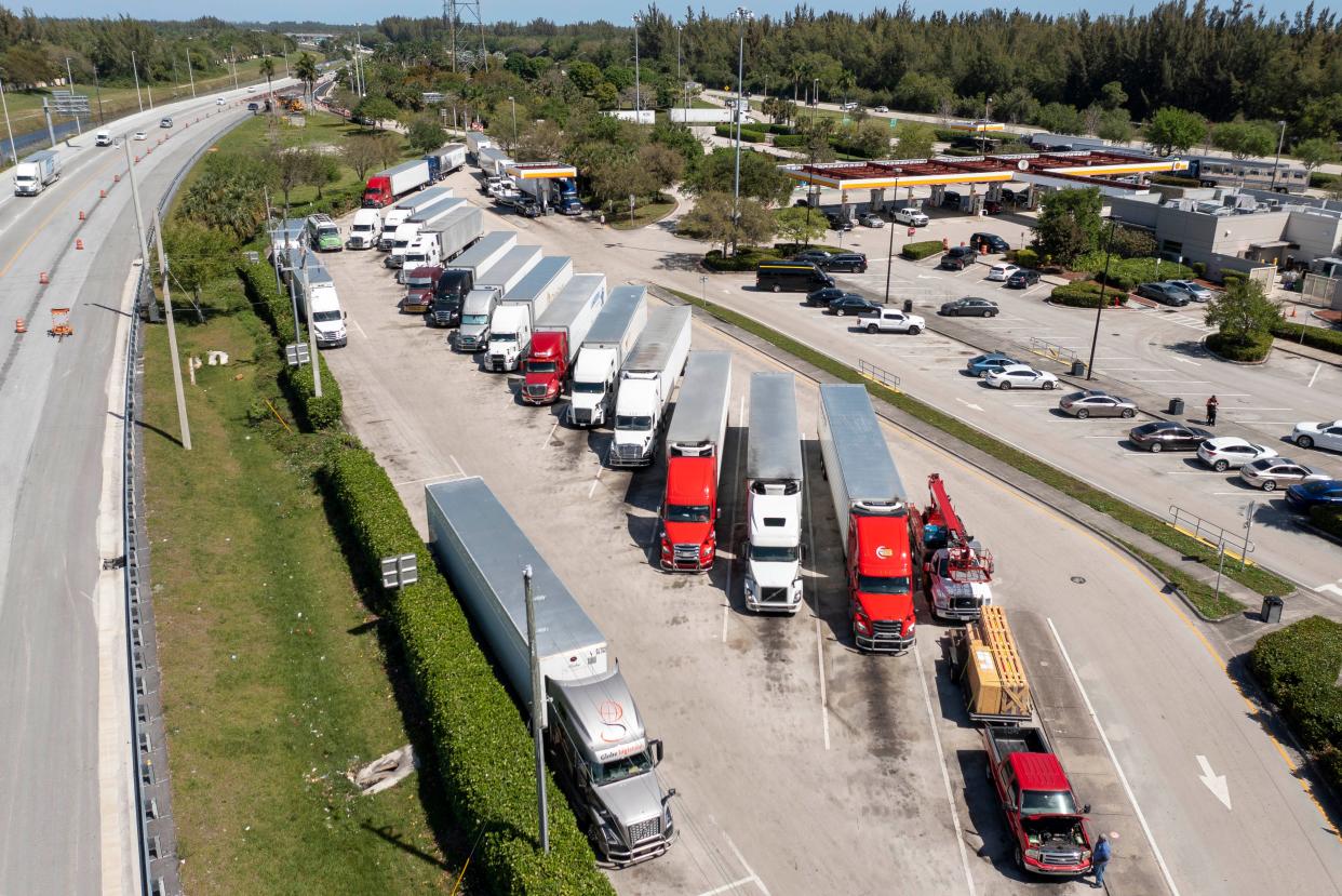 The parking lot for truck drivers is filled on the southbound side of the Florida Turnpike service plaza on March 11, 2024 in West Palm Beach, Florida.