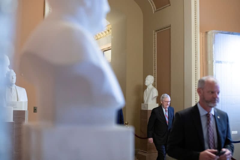 FILE PHOTO: Senate Minority Leader McConnell walks to the Senate Floor on Capitol Hill in Washington