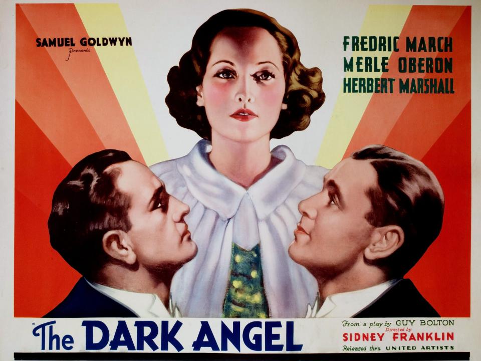 "The Dark Angel" lobby card featuring Frederic March, Merle Oberon, and Herbert Marshall.