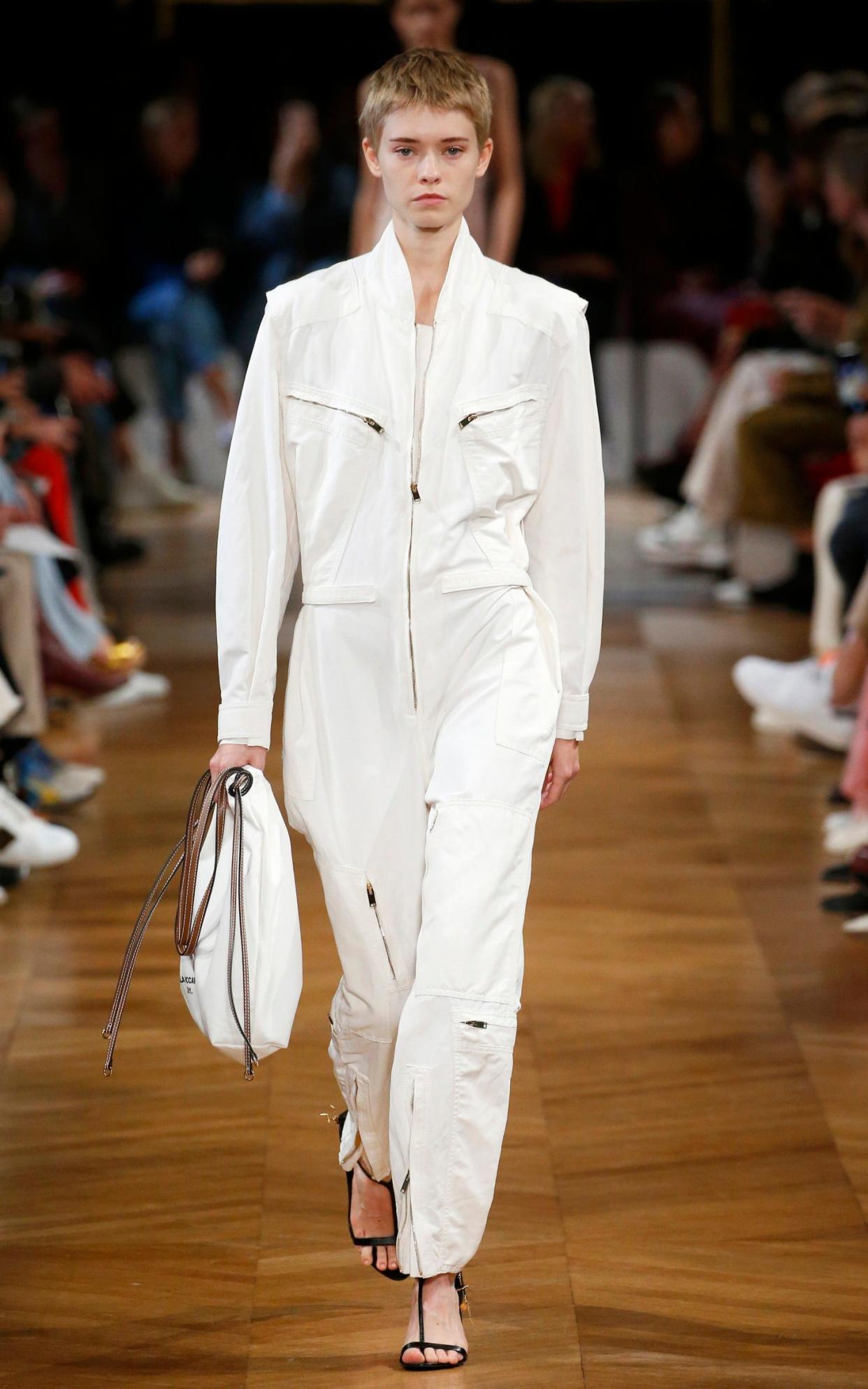 A white boiler suit from Stella McCartney's SS19 collection - Getty Images Europe