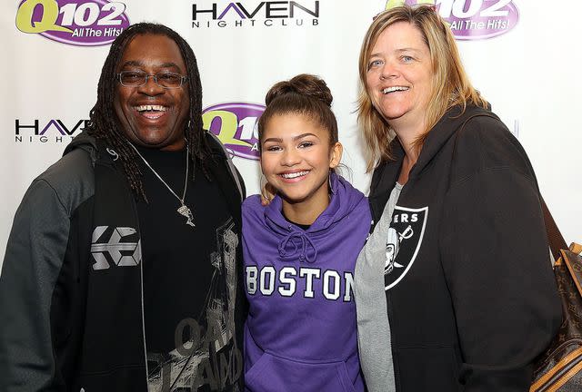 <p>Bill McCay/WireImage</p> Zendaya poses with her father Kazembe Ajamu Coleman and mother Claire Stoermer at the Q012 Performance Theater October 17, 2013.