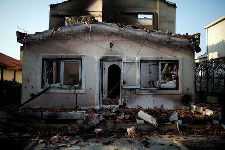 A burnt house is seen following a wildfire at the village of Mati, near Athens, Greece, July 25, 2018. REUTERS/Alkis Konstantinidis