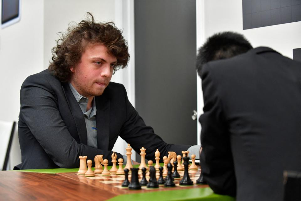 US international grandmaster Hans Niemann waits his turn to move during a second-round chess game against Jeffery Xiong on the second day of the Saint Louis Chess Club Fall Chess Classic in St. Louis, Missouri, on October 6, 2022. - Niemann said on October 5 that he 