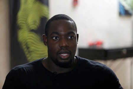 Joshua Richard, Actor of ROK Studios, speaks during an interview with Reuters in Lagos