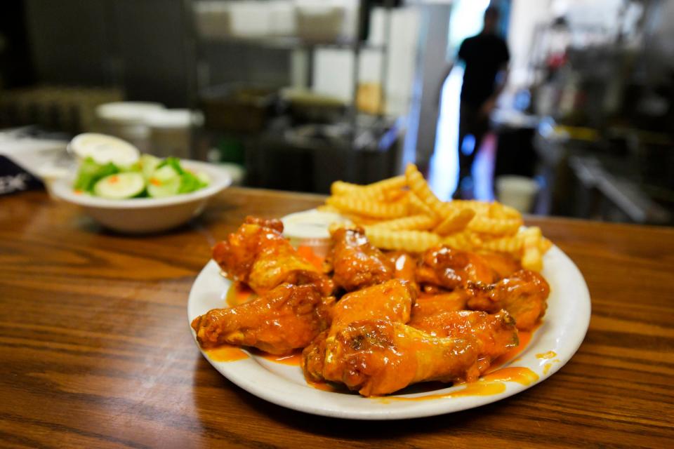 An order of chicken wings with Wing-It's special homemade sauce. After 25 years in the business, Dave and Charleen Morency are reluctantly closing their popular bar and grill and wing restaurant in Mandarin.
