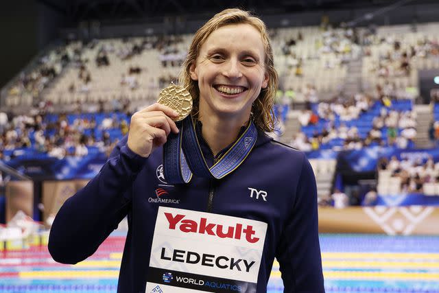 <p>Sarah Stier/Getty</p> Ledecky with a gold medal in July 2023