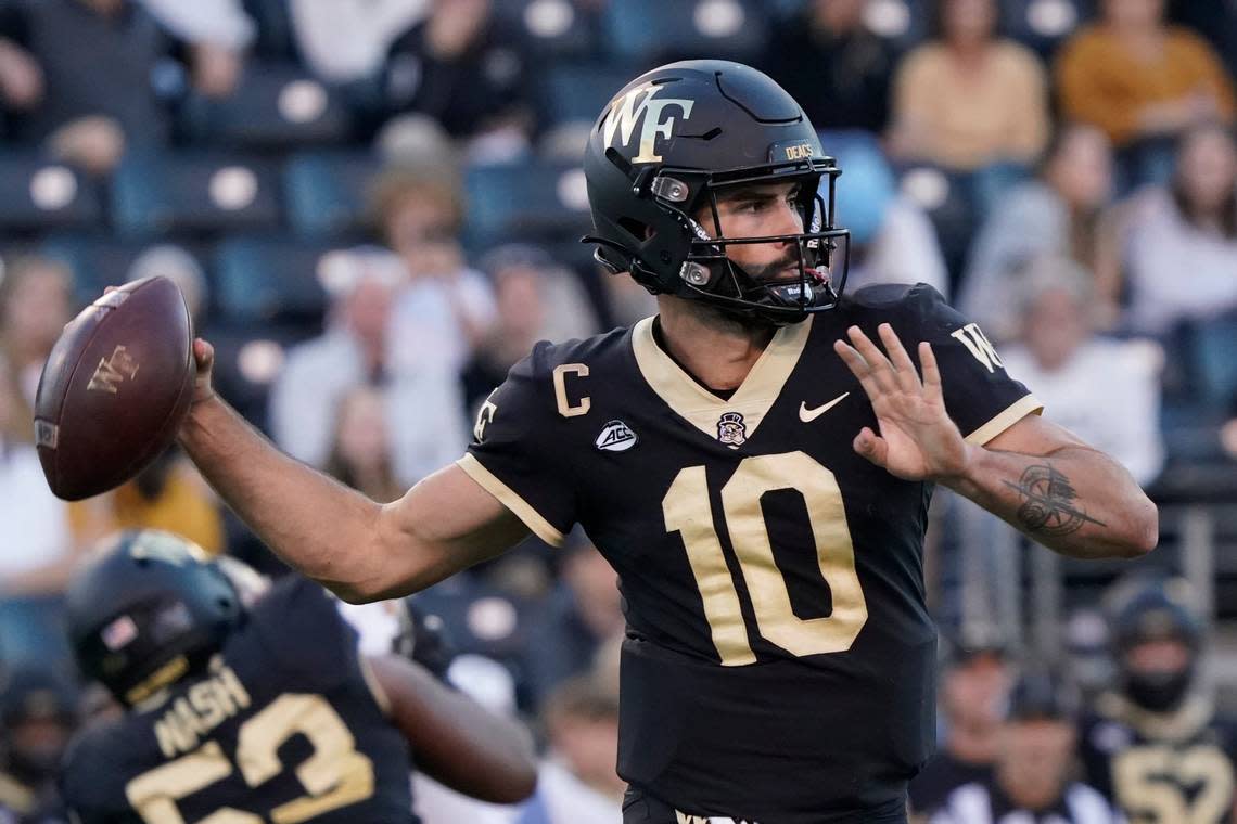 Wake Forest quarterback Sam Hartman (10) looks to pass against Boston College during the second half of an NCAA college football game in Winston-Salem, N.C., Saturday, Oct. 22, 2022.