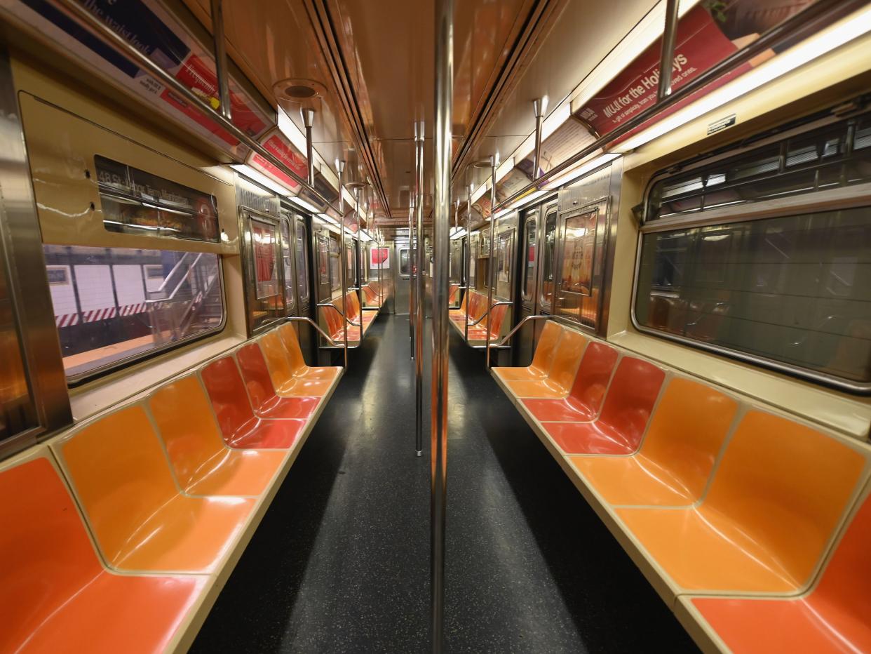 <p>An empty New York Subway car is seen on 23 March, 2020 in New York City</p> (AFP via Getty Images)
