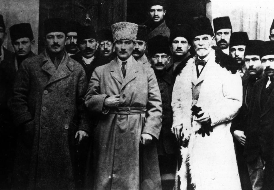 Mustafa Kemal Atatürk, center, future president of the Republic of Turkey, posing with some other people attending the Sivas Congress in the city of Sivas in September 1919. (Photo: Mondadori via Getty Images)