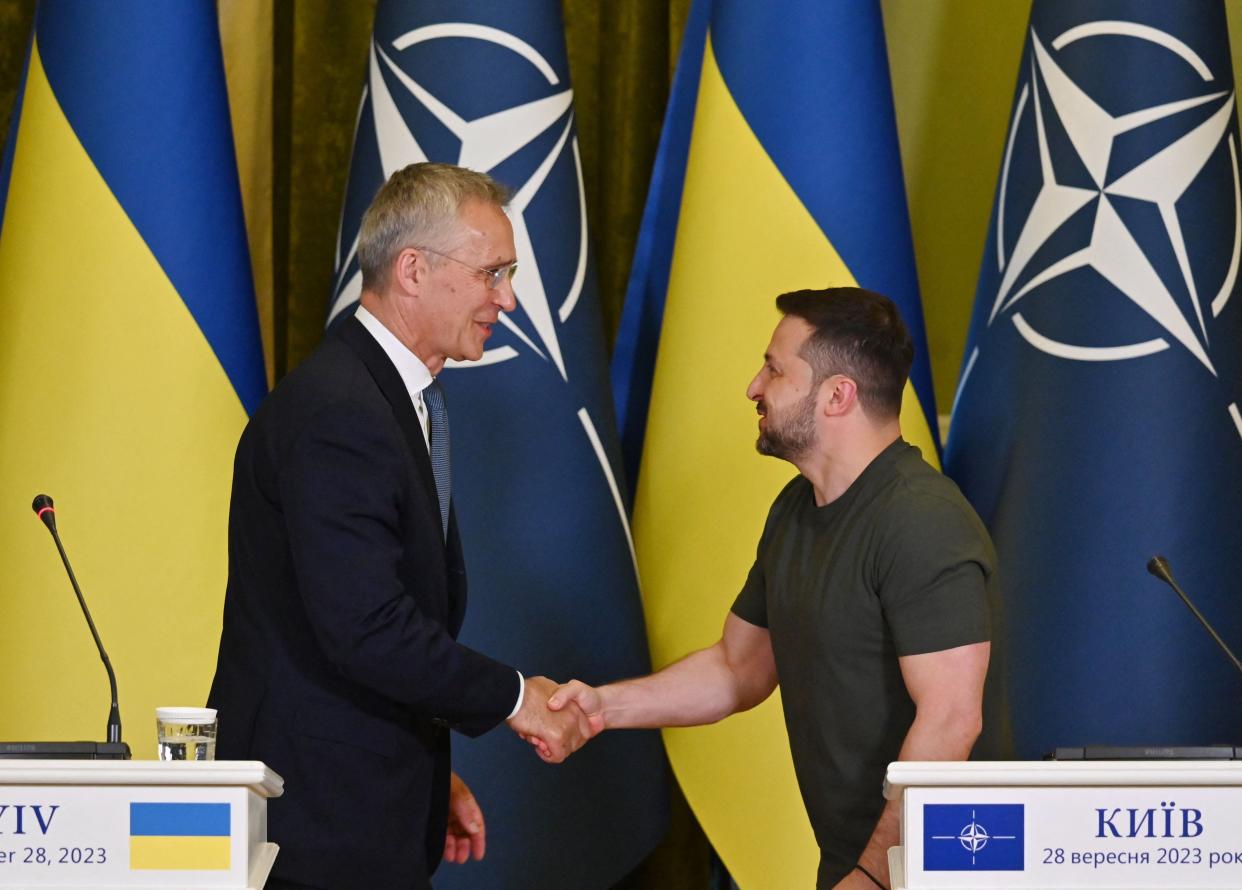 Ukrainian President Volodymyr Zelensky (right) and Secretary General of NATO Jens Stoltenberg shake hands (AFP via Getty Images)