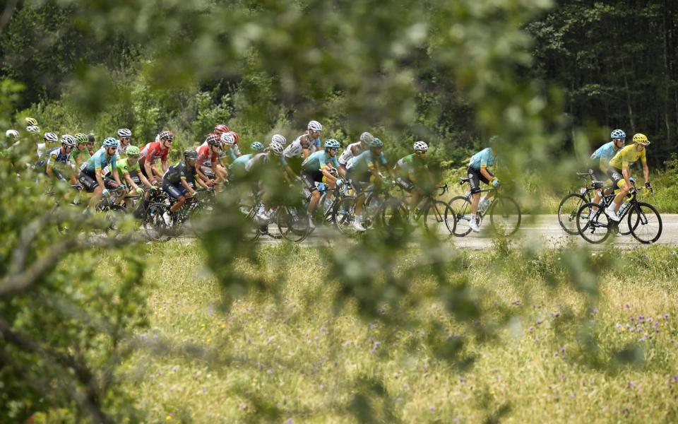 Chris Froome leads the race through the mountains - Credit: Getty