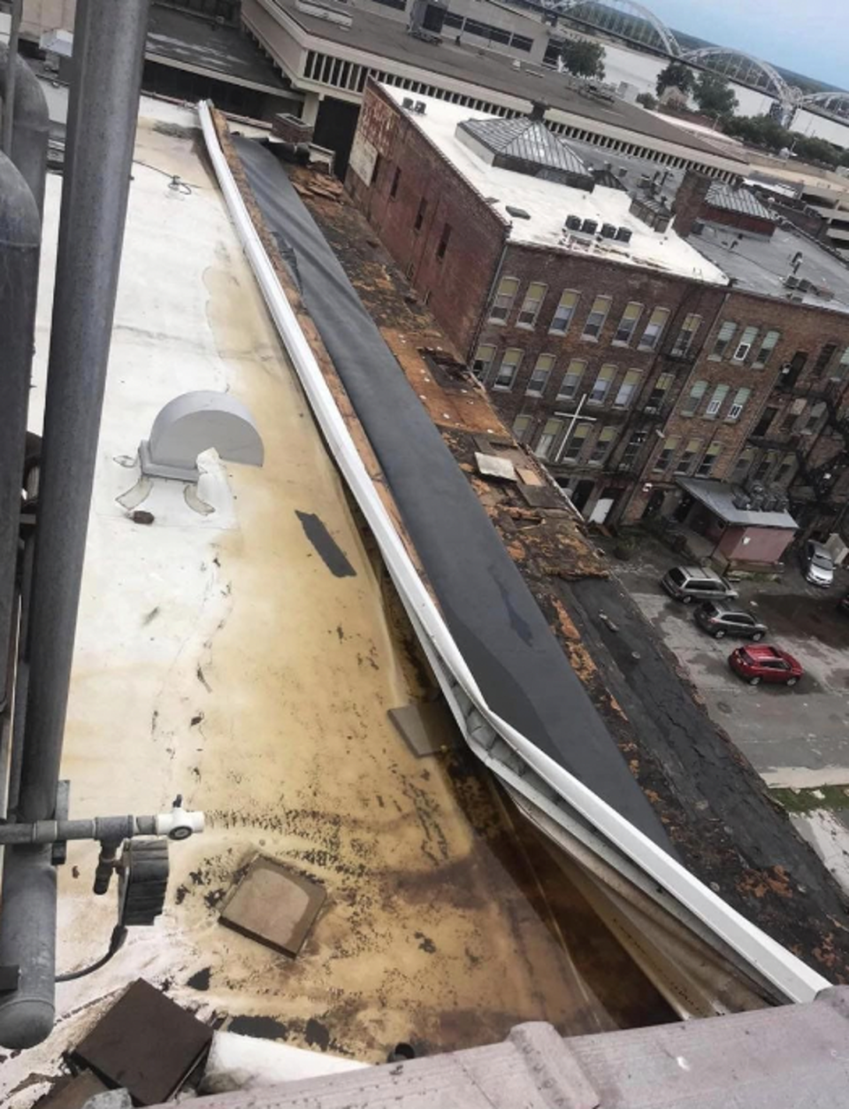 Aarron Aguilar took this picture of The Davenport’s roof after a storm hit Iowa in 2020. Mr Aguilar says he believes the damage caused three years ago may have been one of the underlying reasons why the structure finally came crashing down (Aaron Aguilar)