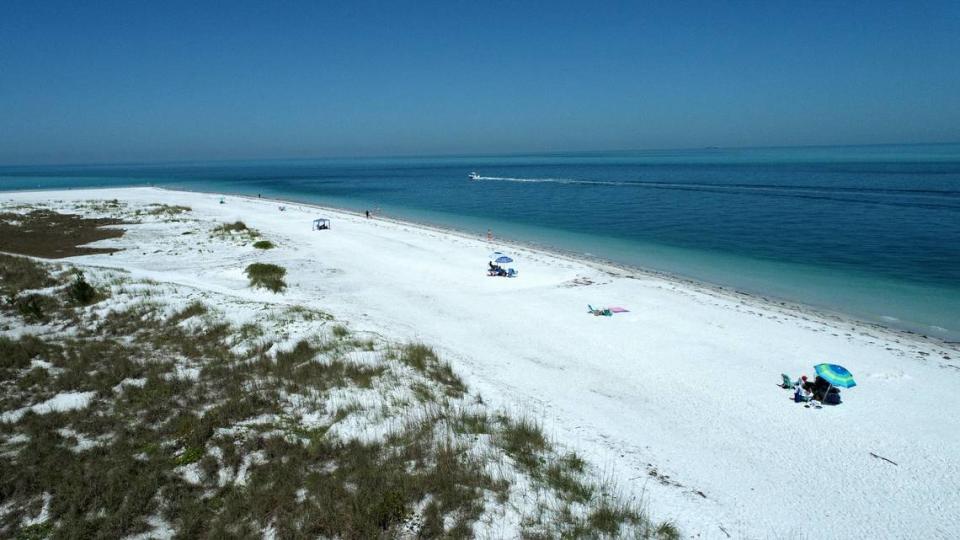 Bean Point on the northern tip of Anna Maria Island is a popular spot for beachgoers, seen on Monday, April 15, 2024. Manatee County may add another 1% to the bed tax charged to area visitors. Tiffany Tompkins/ttompkins@bradenton.com