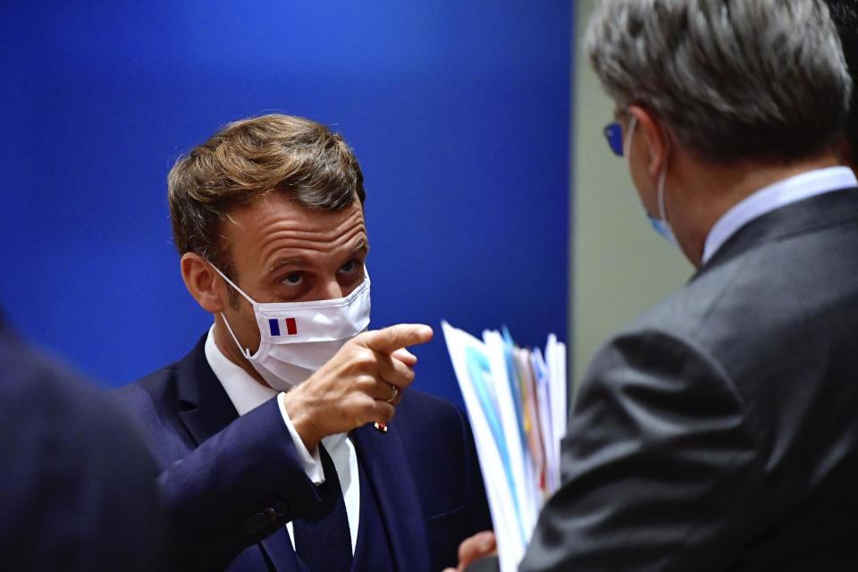 French President Emmanuel Macron at a round table meeting during the EU summit in Brussels: AP