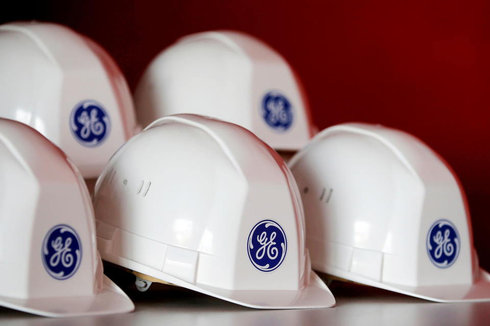 The General Electric logo is pictured on working helmets during a visit at the General Electric offshore wind turbine plant in Montoir-de-Bretagne, near Saint-Nazaire, western France, November 21, 2016. REUTERS/Stephane Mahe