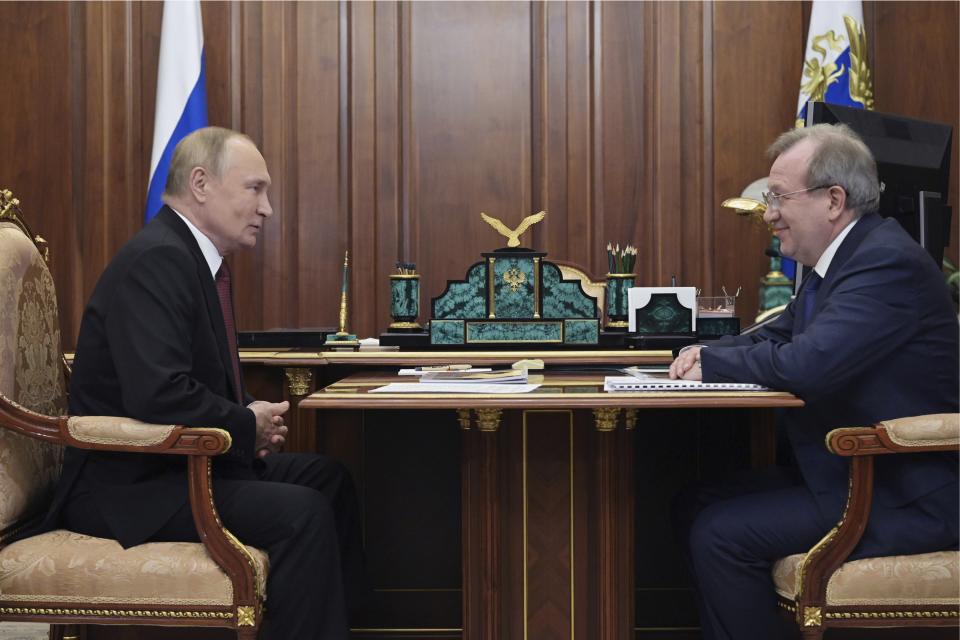 FILE - Russian President Vladimir Putin, left, meets with the President of the Russian Academy of Sciences Gennady Krasnikov at the Kremlin in Moscow, Russia, Nov. 11, 2022. As Russia faces mounting setbacks in Ukraine, Putin appears to have delegated delivering unpopular news to others — a tactic he has already used during the coronavirus pandemic. (Aleksey Babushkin, Sputnik, Kremlin Pool Photo via AP, File)