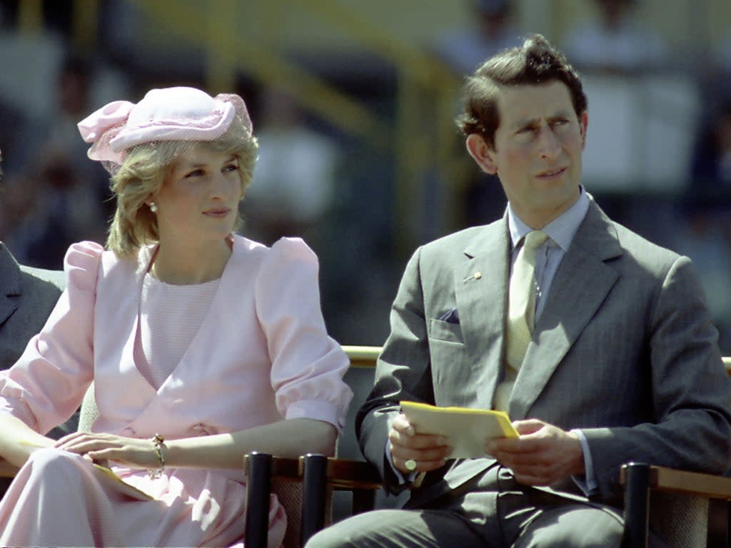 Princess Diana and Prince Charles watch an official event during their first royal Australian tour 1983 (Getty)