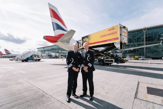 Twins Jeremy, left, and Nicholas Hart, who have retired as British Airways pilots after landing their final flights just 30 seconds apart at Heathrow Airport