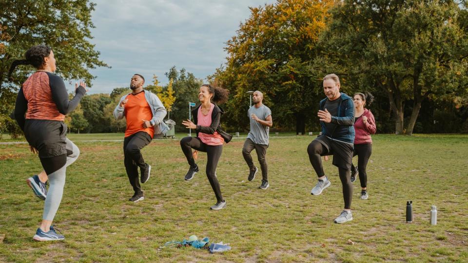 Group exercise class in a park