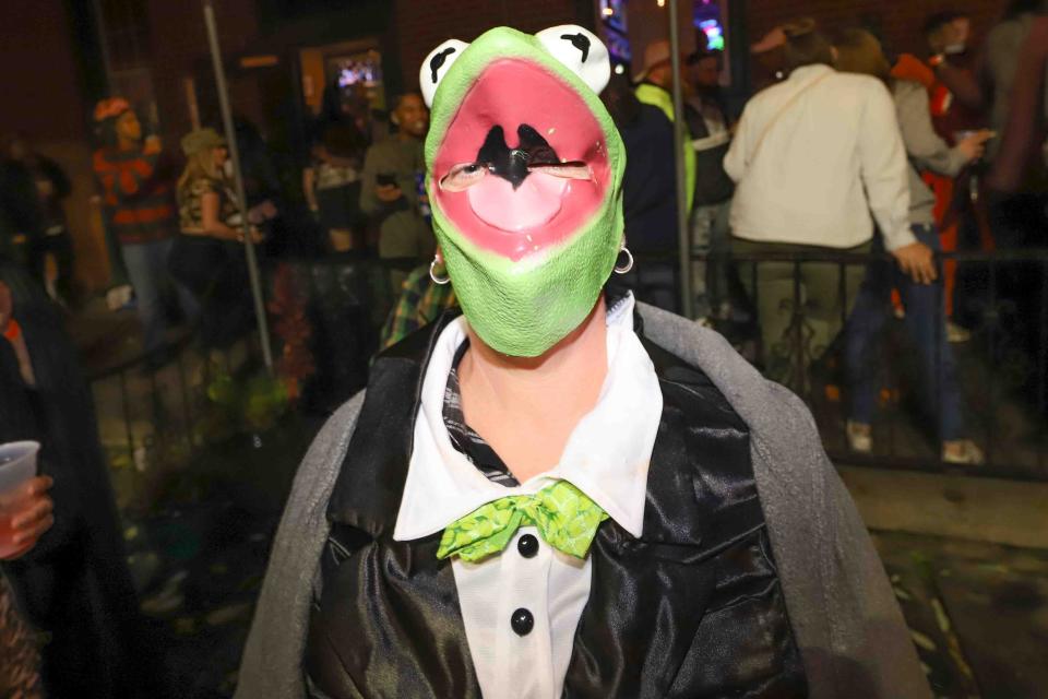 Patrons pose for a photo during the annual Trolley Square Halloween Loop Saturday, Oct. 27, 2018, at Kelly's Logan House in Wilmington.