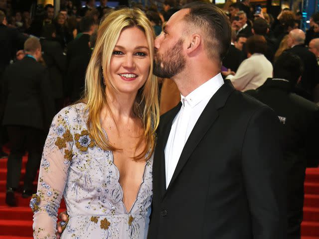 <p>David M. Benett/Dave Benett/Getty</p> Julia Stiles (L) and Preston J.Cook attend the 70th EE British Academy Film Awards