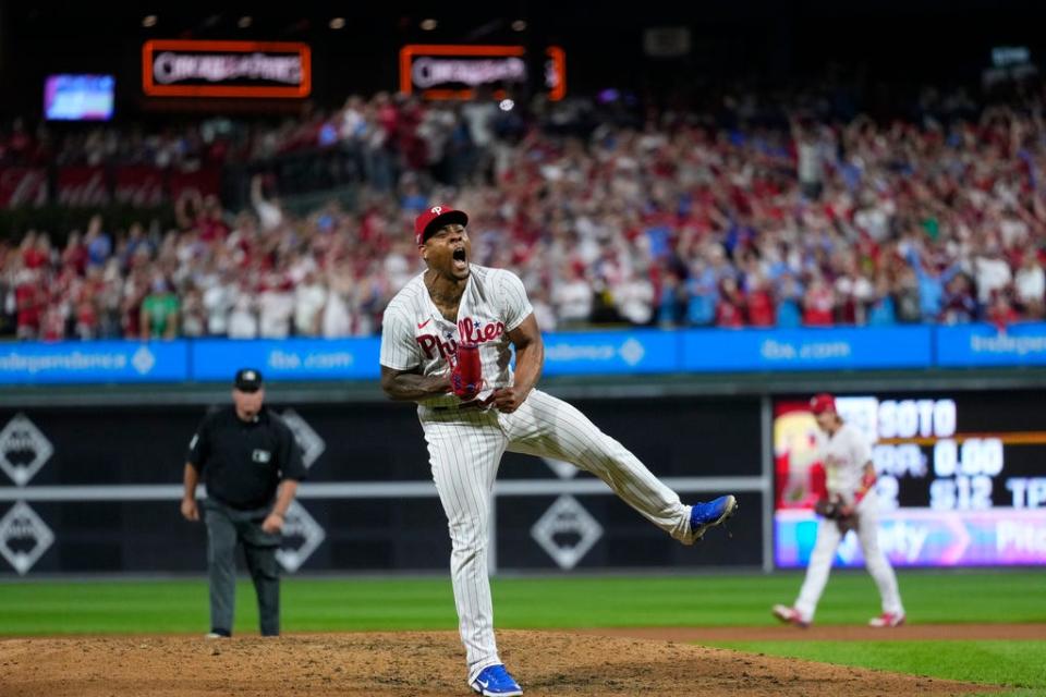 Philadelphia Phillies pitcher Gregory Soto celebrates the team's win over the Miami Marlins in Game 2 of an NL wild-card baseball playoff series Wednesday, Oct. 4, 2023, in Philadelphia. The Phillies swept the series, and move on to face the Atlanta Braves. (AP Photo/Matt Rourke)