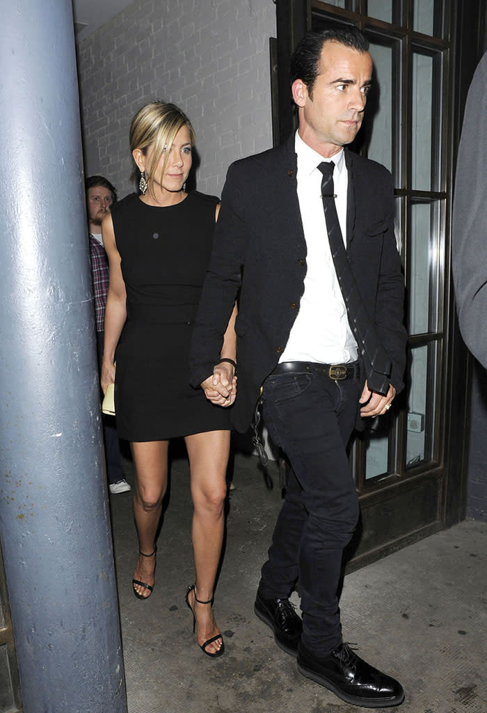 LOVED UP! Jennifer Aniston and new beau Justin Theroux spotted leaving Shoreditch House hand-in-hand - their first PDA!