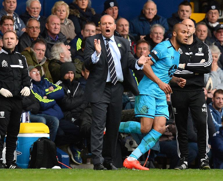 West Bromwich Albion's manager Pepe Mel (C) watches his team's English Premier League match against Tottenham Hotspur in West Bromwich on April 12, 2014