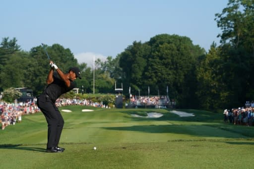 Tiger stormed into contention with back-to-back birdies to start his third round