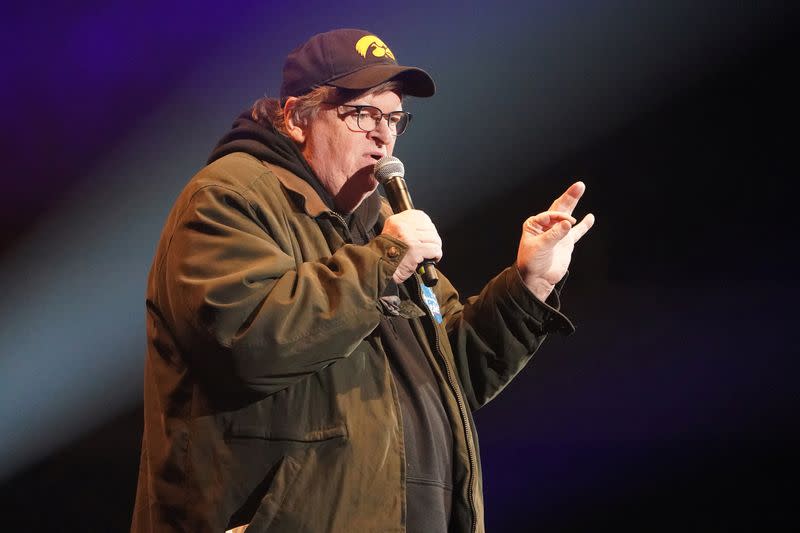 FILE PHOTO: Director Moore speaks during a rally by U.S. Democratic presidential candidate Sanders in Cedar Rapids