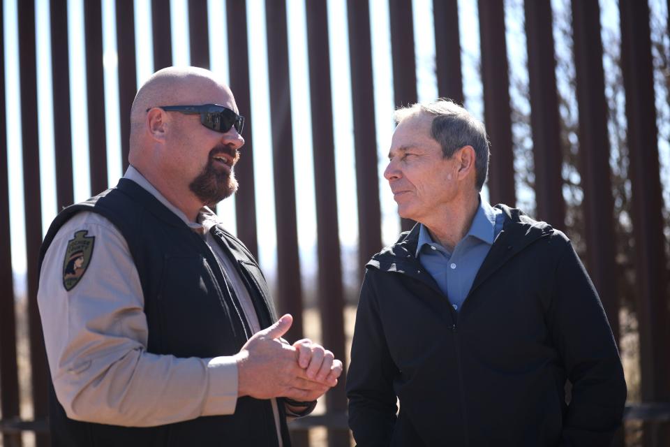 Rep. John Curtis, R-Utah, visits with an Arizona law enforcement officer at the U.S.-Mexico border on Thursday, Feb. 8, 2024. | Gage Skidmore