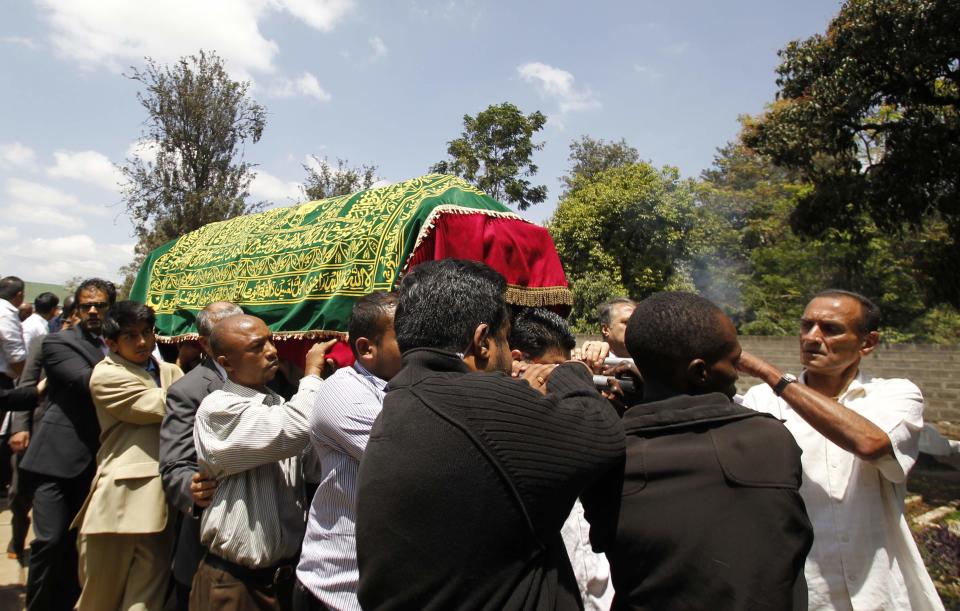 Relatives and friends carry the coffin of Kenyan journalist Sood, who was killed in the Westgate shopping mall attack, during her funeral in Nairobi
