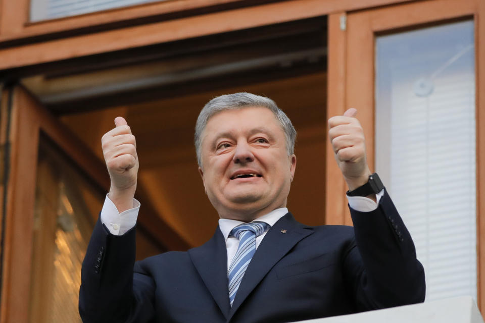 Ukrainian President Petro Poroshenko gestures as he greets his supporters who have come to thank him for what he did as a president, in Kiev, Ukraine, Monday, April 22, 2019. Political mandates don't get much more powerful than the one Ukrainian voters gave comedian Volodymyr Zelenskiy, who as president-elect faces daunting challenges along with an overwhelming directive to produce change. (AP Photo/Vadim Ghirda)
