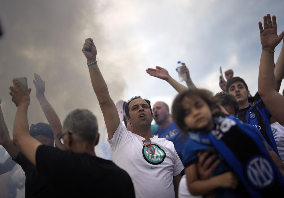 Supporters of Inter Milan chant slogans as they gather at Taksim square in Istanbul, Turkey, Friday, June 9, 2023. Manchester City will play Inter Milan in the final of the Champions League on Saturday June 10 in Istanbul.(AP Photo/Khalil Hamra)