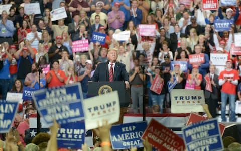 Donald Trump pauses while speaking during a rally in Springfield, Missouri - Credit: Neeta Satam/Bloomberg