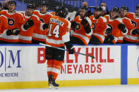 Philadelphia Flyers forward Sean Coutirier (14) celebrates his goal during the first period of an NHL hockey game against the Buffalo Sabres, Saturday, Feb. 27, 2021, in Buffalo, N.Y. (AP Photo/Jeffrey T. Barnes)