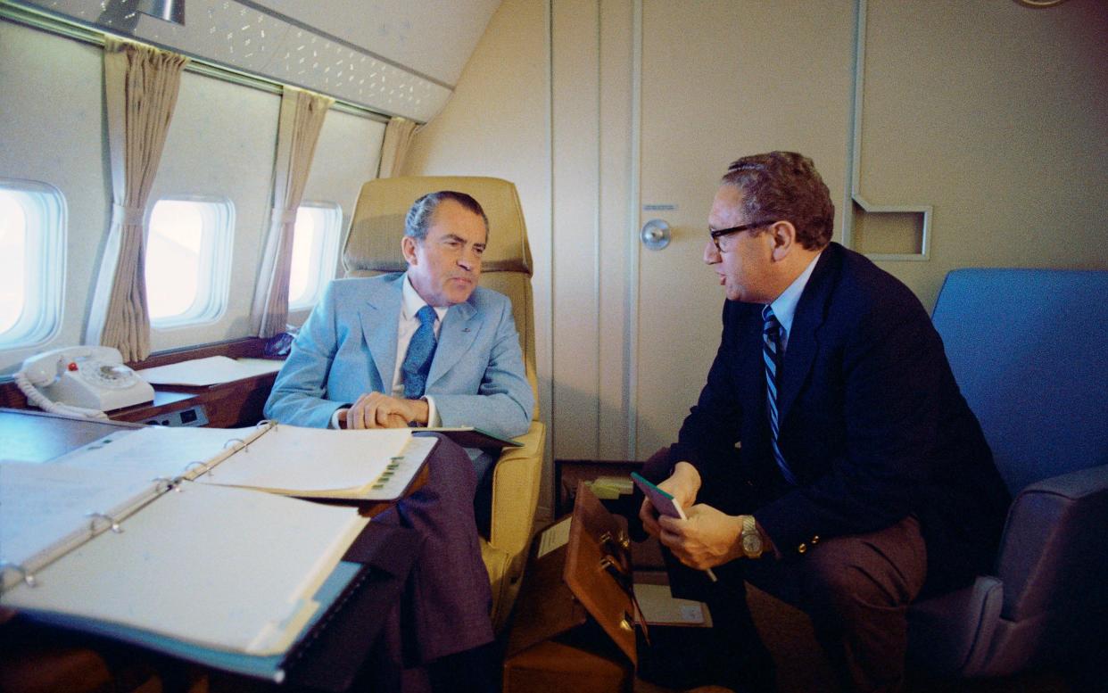 President Nixon with his National Security Advisor Henry Kissinger, en route to China in 1972 - HUM Images/Universal Images Group via Getty Images