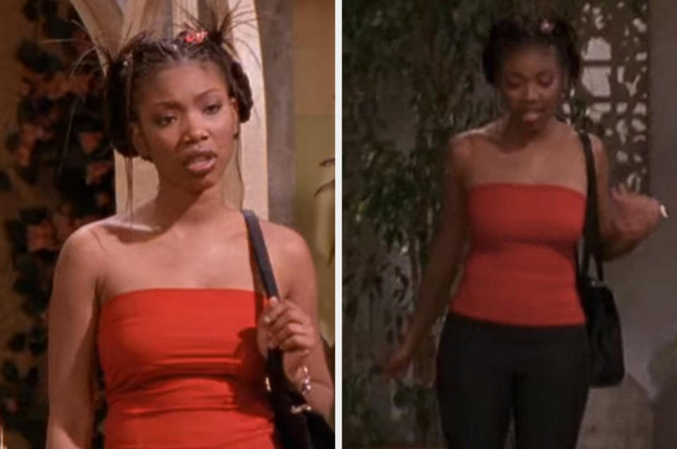 Moesha wearing a tube top and pants