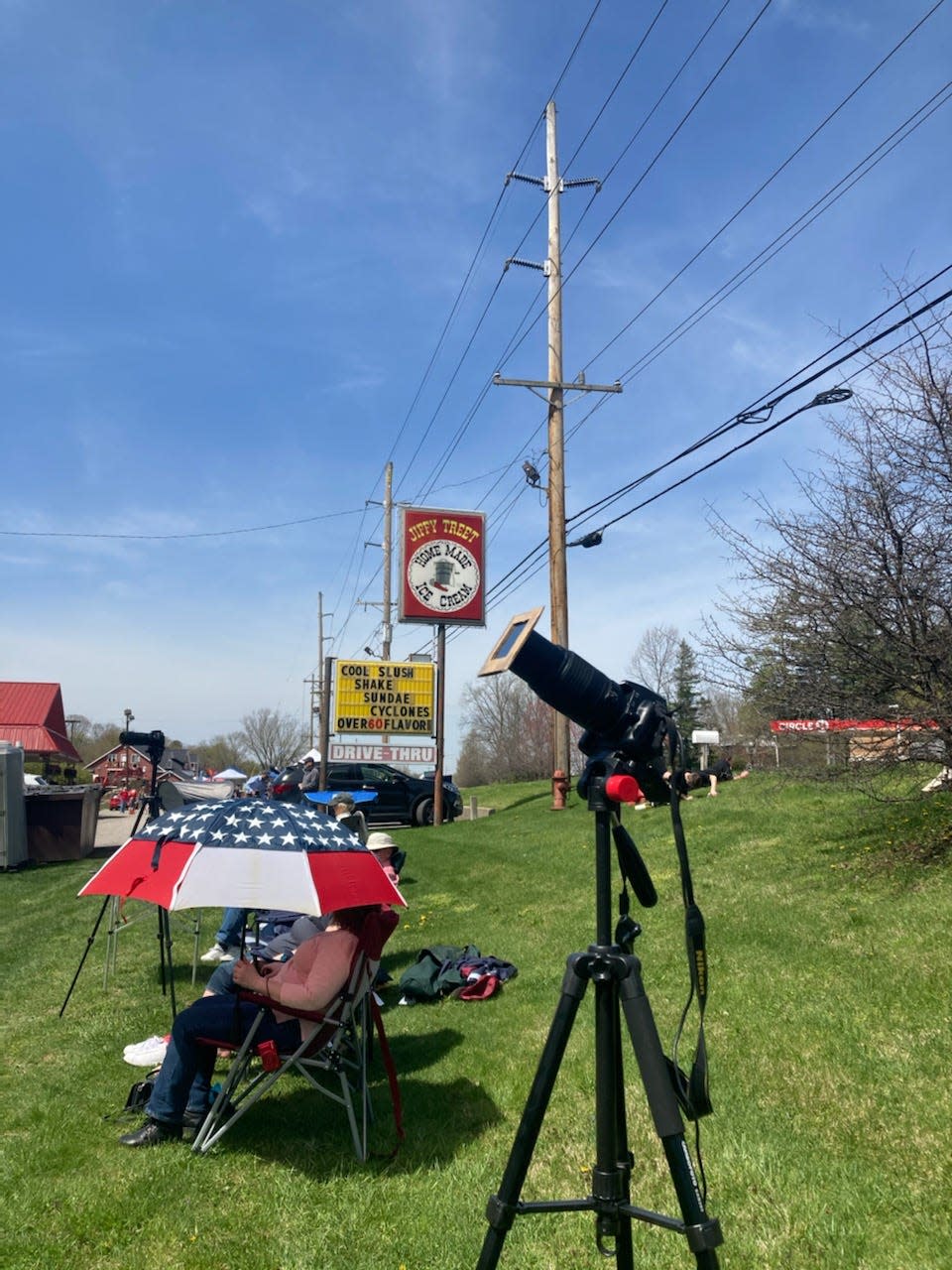 A telescope fitted with a solar filter is ready to catch a view of the solar eclipse at Jiffy Treet in Ellettsville on Monday, April 8, 2024.