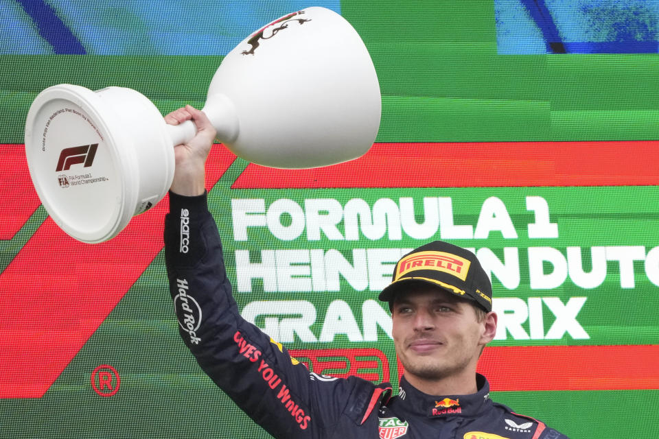 Red Bull driver Max Verstappen of the Netherlands celebrates winning the Formula One Dutch Grand Prix auto race, at the Zandvoort racetrack, in Zandvoort, Netherlands, Sunday, Aug. 27, 2023. (AP Photo/Peter Dejong)