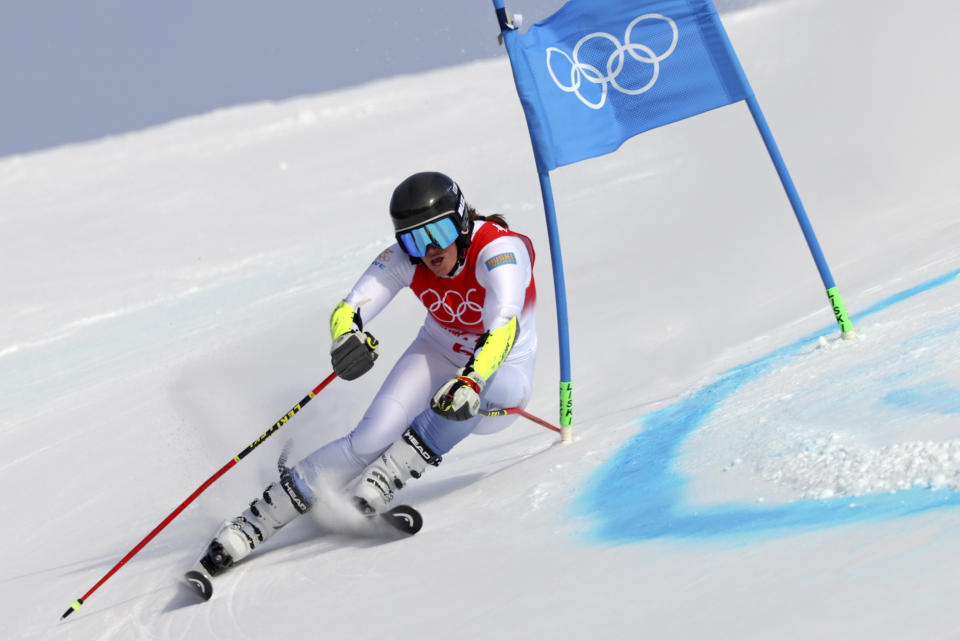 Sara Hector of Sweden passes a gate as she skis to the gold medal in the second run of the women's giant slalom at the 2022 Winter Olympics, Monday, Feb. 7, 2022, in the Yanqing district of Beijing. (AP Photo/Alessandro Trovati)