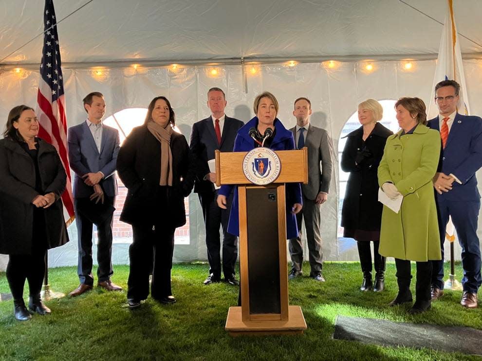 Gov. Maura Healey speaks at a press conference in Brookline Tuesday to announce decarbonization grants for 10 housing developments throughout the state.