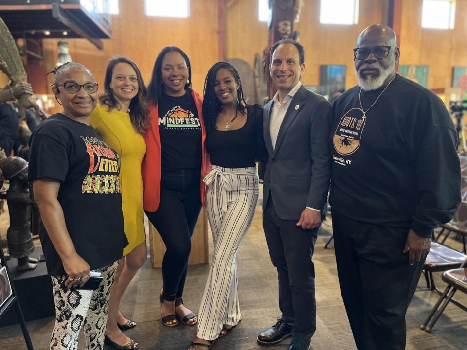 From left to right: Karen Mcknight, three of the organizers of MindFEST-- Amanda Villaveces, Lauren Muir, and Jasmine Presley-- Mayor Craig Greenberg and Lamont Collins, founder and CEO of the Roots 101 Museum.