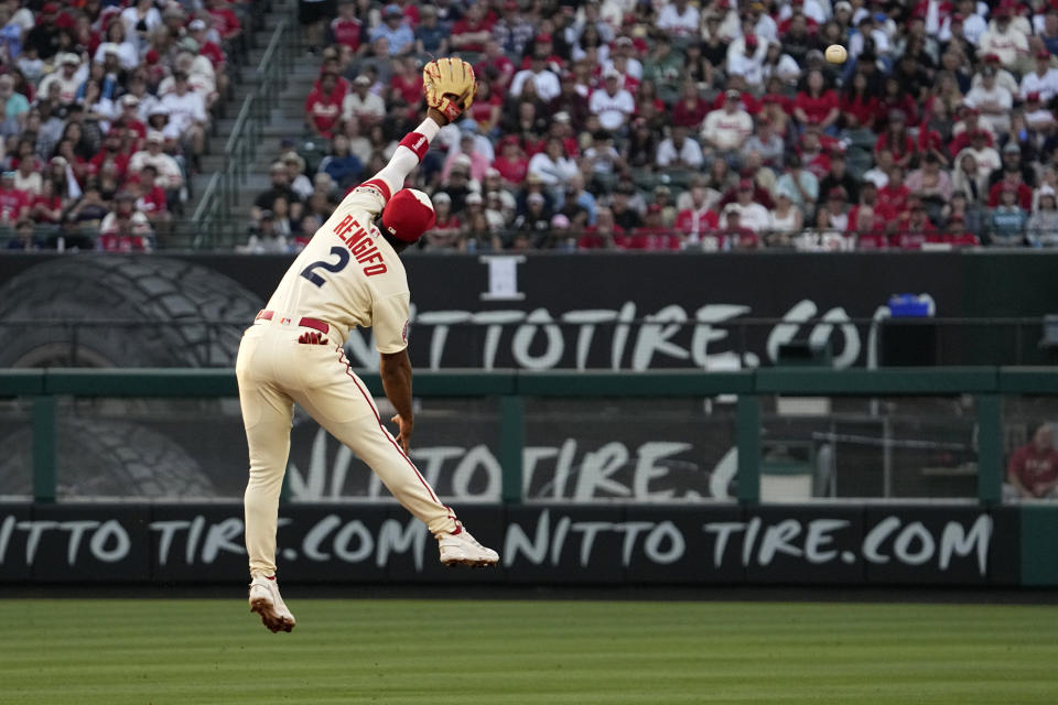 Los Angeles Angels second baseman Luis Rengifo can't get to a ball hit for a single by Arizona Diamondbacks' Gabriel Moreno during the second inning of a baseball game Saturday, July 1, 2023, in Anaheim, Calif. (AP Photo/Mark J. Terrill)