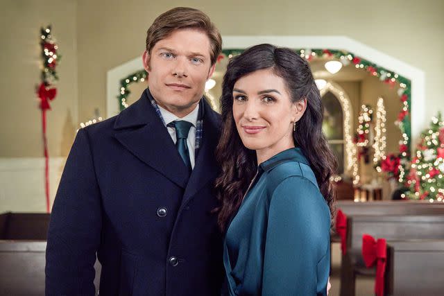 <p>Courtesy of Hallmark</p> Chris Carmack and Shenae Grimes-Beech in 'Time for Her to Come Home for Christmas'