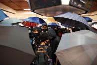 Anti-government protesters attend a demonstration at New Town Plaza shopping mall in Hong Kong