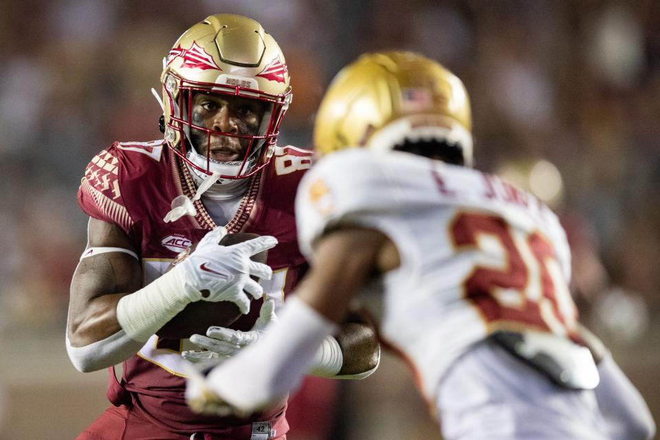 Florida State Seminoles tight end Camren McDonald (87) runs the ball down the field. The Florida State Seminoles lead the Boston College Eagles at the half 31-0 Saturday, Sept. 24, 2022.