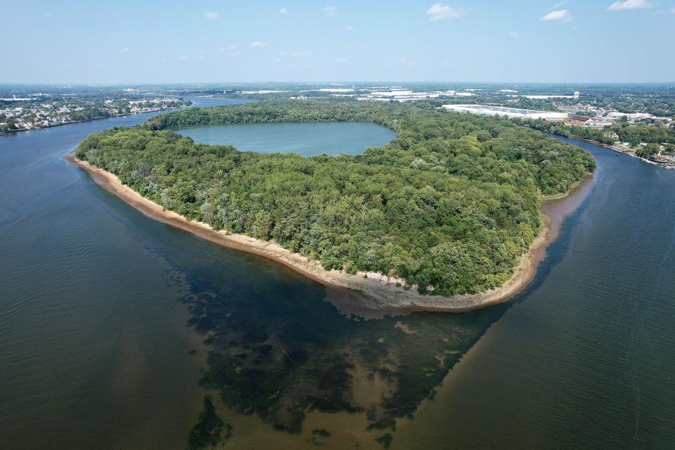 Burlington Island, shown Wednesday, August 9, 2023, sits in the middle of the Delaware River between Bristol, PA, (left) and Burlington, NJ (right).